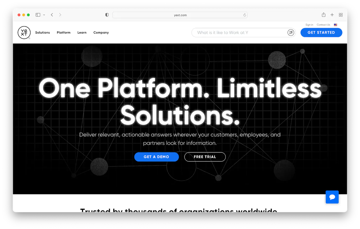 Screenshot of the Yext homepage reading 'One Platform. Limitless Solutions.' on a dark network background