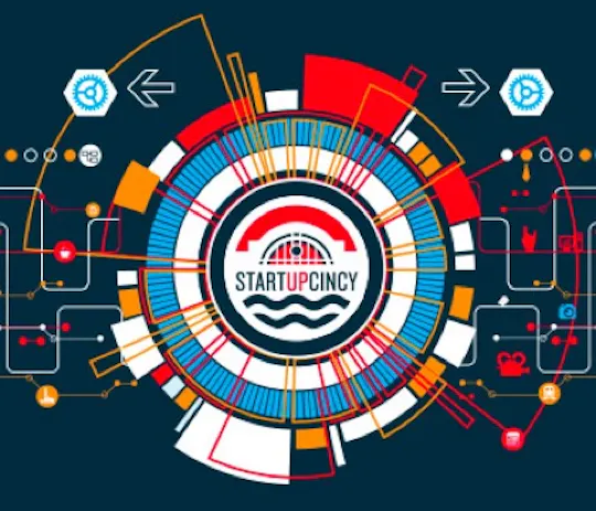 StartupCincy logo inside a colorful circuit-board style ring illustration