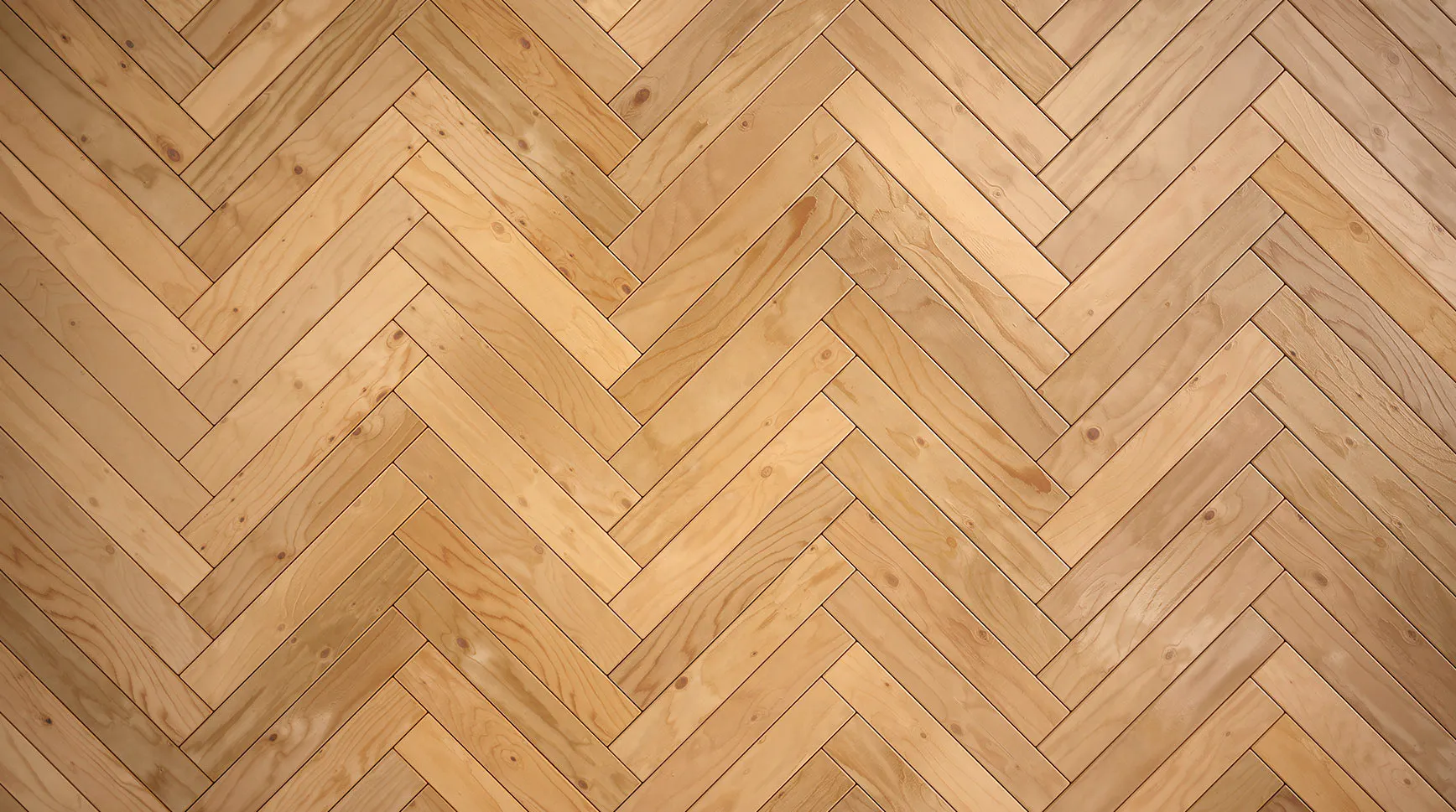 Light oak flooring laid in a herringbone pattern